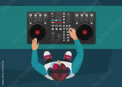 DJ playing vinyl. Top view. DJ Interface workspace mixer console turntables. Night club concept. DJ young man.