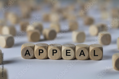 appeal - cube with letters, sign with wooden cubes