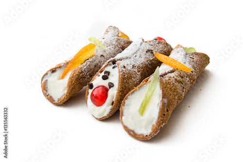 Sicilian cannoli, italian dessert with ricotta cheese, chocolate chips and candied fruit 