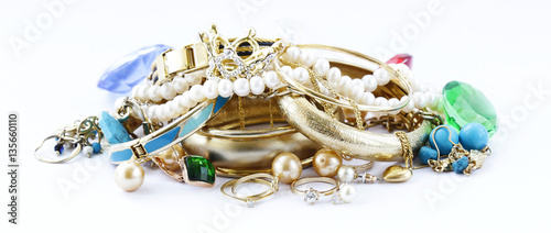 gold jewelry and pearls, bracelets and chains
