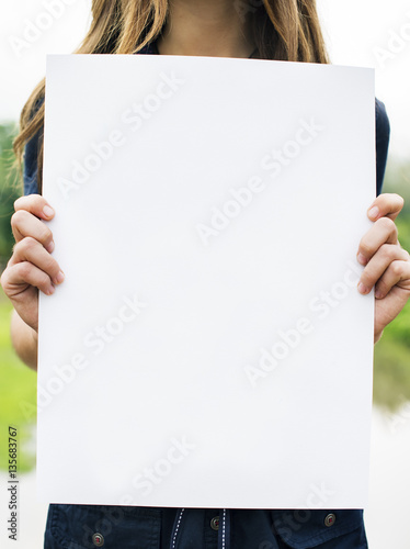 Woman Holding Blank Paper Concept