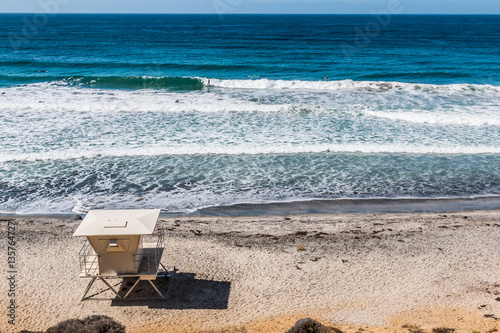 View from above of lifeguard tower facing ocean in Encinitas, California.