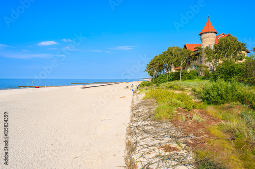 View of Leba beach and famous hotel Neptun, Baltic Sea, Poland