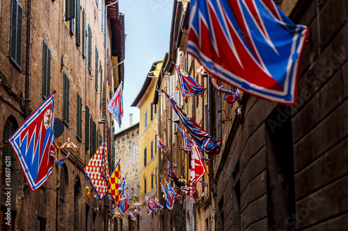 Banners of the contrads in Siena. Feast Palio. Region of Tuscany, Italy