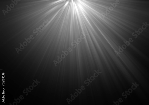 abstract beautiful rays of light on black background.