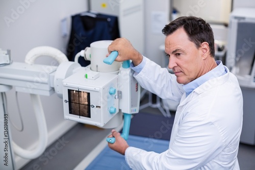 Doctor using x-ray machine