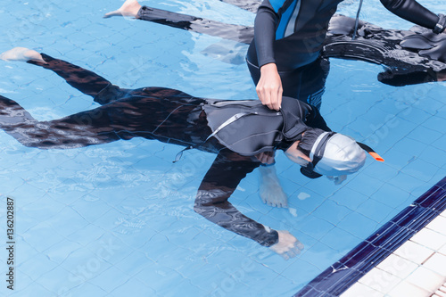 Free diving training on swimming pool
