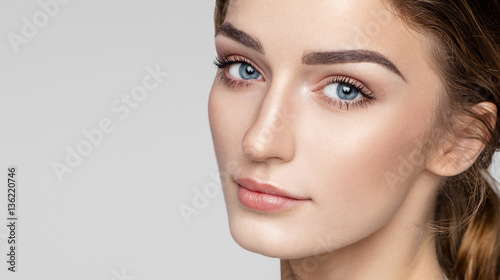 Beauty portrait of female face with natural clean skin