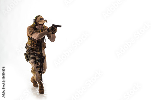 man military outfit a mercenary soldier in modern times on a white background in studio