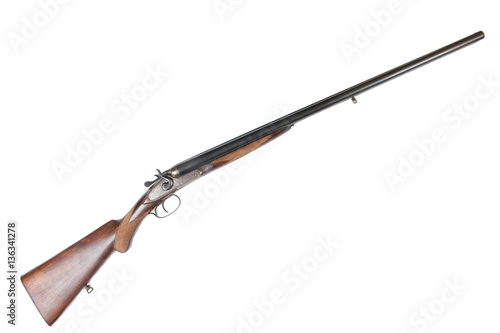 Old Soviet 12-gauge side-by-side double-barreled hunting gun on a white background