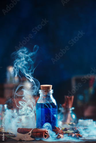 Magical elixir with clouds of rising smoke