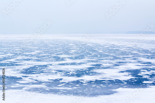 Frozen lake on a winter day