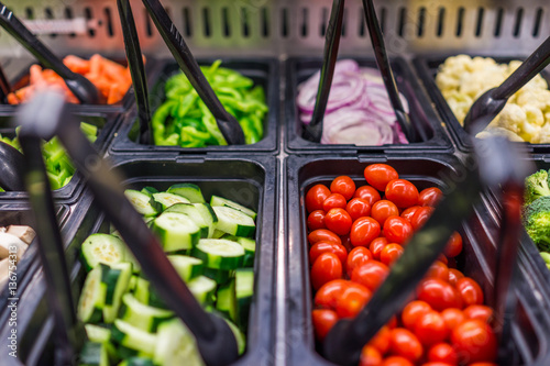 Vegetable salad bar with tomatoes and cucumbers