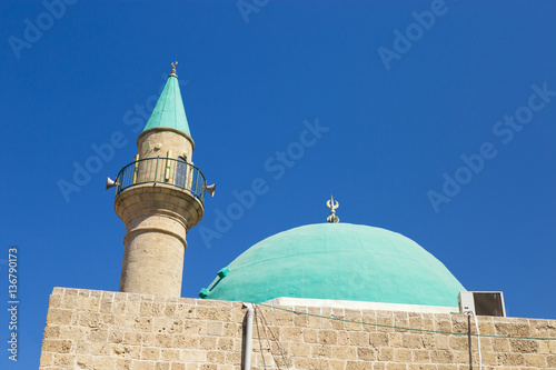 A beautiful Sinan Basha Mosque with green dome in the old town o