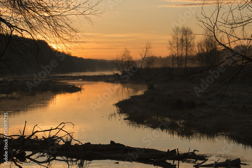 Beginning of sunrise over the river