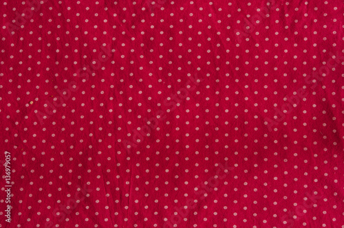 red background with polka dots