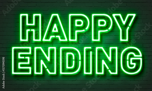 Happy ending neon sign on brick wall background.