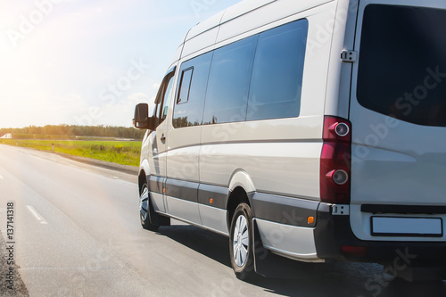 minibus goes on the country highway