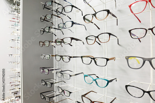 Showcase with spectacles in modern ophthalmic store