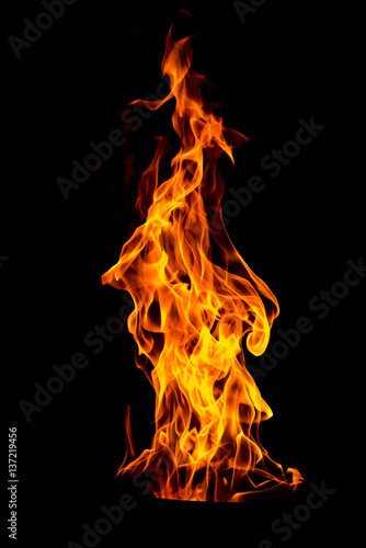 Fire flame isolated on black isolated background - Beautiful yellow, orange and red and red blaze fire flame texture style.