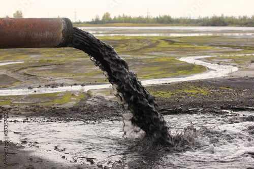 Industrial pipe discharging liquid waste 