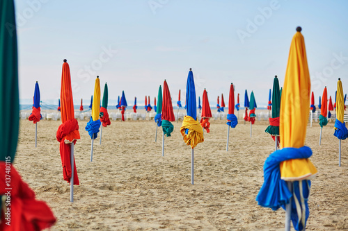 Colorful parasols on Deauville Beach, Normandy, France