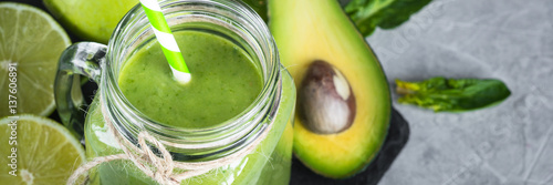 Healthy green smoothie in mason jar. Long banner format