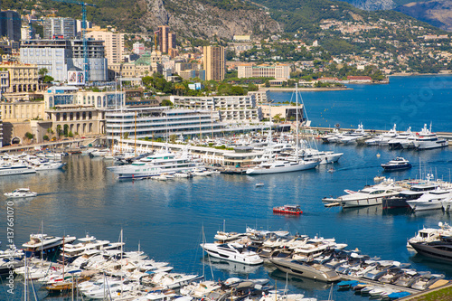 Principality of Monaco. View of the seaport and the city of Monte Carlo with luxury yachts and sail boats 