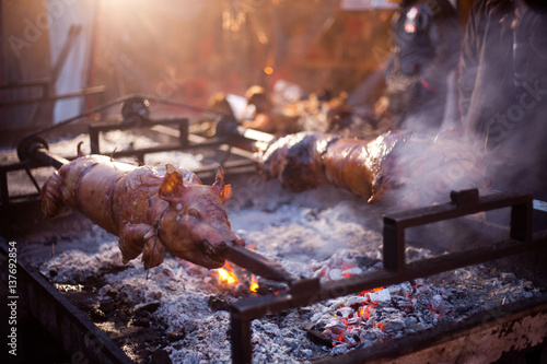 Roasted pig on a spit, the Serbian traditional barbecue concept.