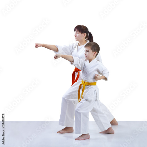 Mother and son are training punch arm