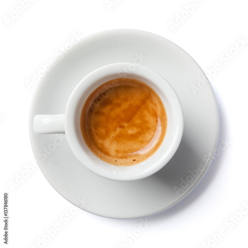 Close up of coffee cup and saucer. Top view, isolated on white.