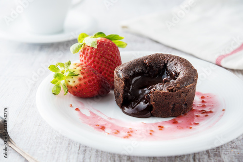 Chocolate souffle with strawberries
