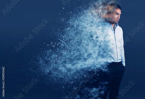 jeune homme élégant avec un effet de dispersion de particules