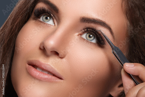 Beautiful woman with eyelash extension