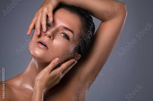 Beautiful woman with oily and wet skin