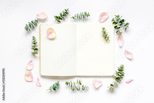 woman table with flower and herbs top view white background mock up