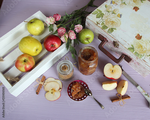 Apple jam on the lili background with brown sugar and group of apples