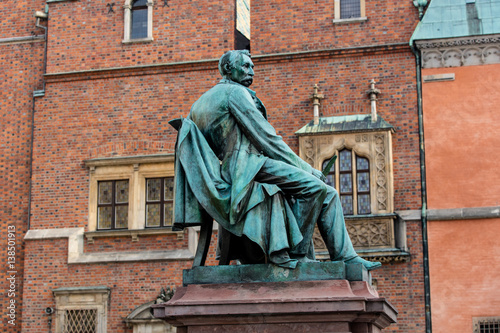 statue of the Polish poet, playwright and comedy writer Aleksander Fredro in the Market Square in front of the Town Hall of Wroclaw, Poland