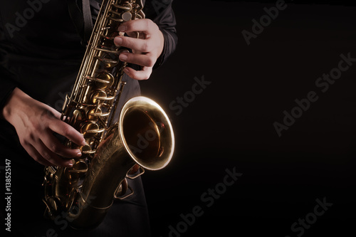 Saxophone player Saxophonist playing jazz music instruments