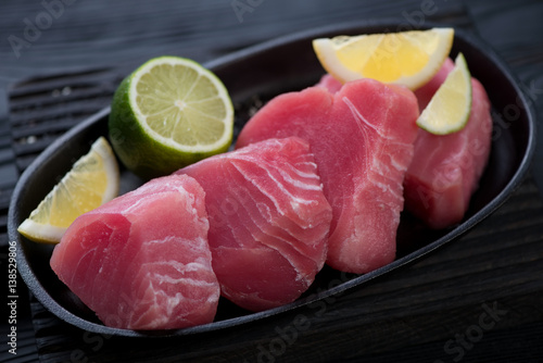 Slices of raw fresh tuna fillet, close-up, selective focus