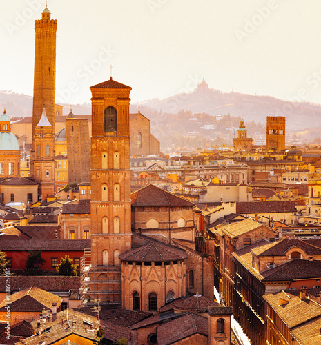 Bologna, cityscape with towers and buildings, San Luca Hill in background