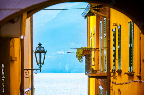 View of the lake of Como through old-fashioned windows