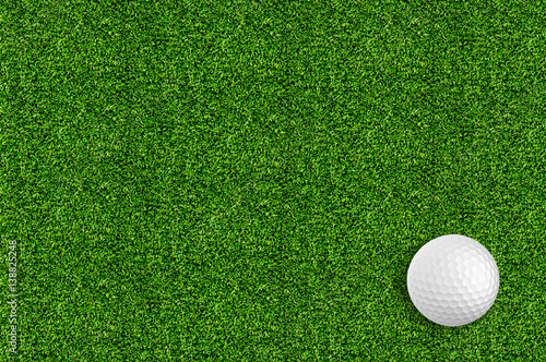 golf ball on the green grass of the golf course