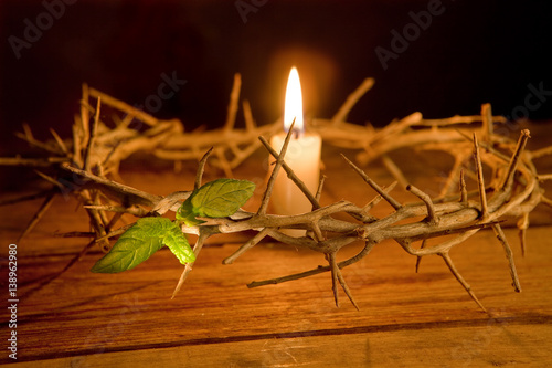 Crown of thorns and candle