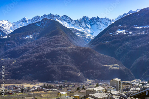 Mountains and cliffs during winter in Valtellina, Italy