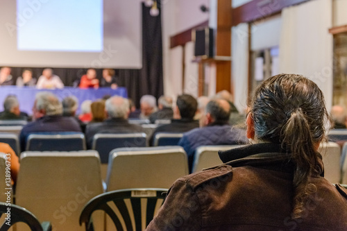 people at the conference in the conference hall