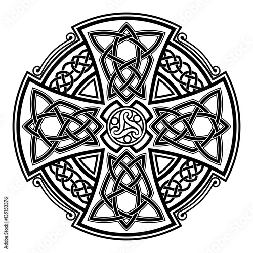 Celtic national ornament in the shape of a cross. Black ornament isolated on white background.