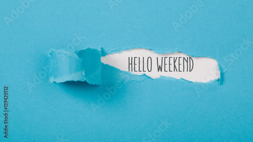 Hello Weekend message on Paper torn ripped opening