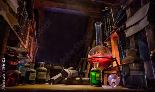 Medieval alchemist laboratory with various kind of flasks in Prague, czech republic