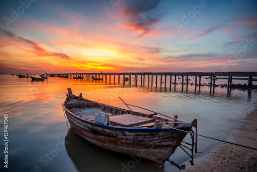 Beautiful sunset landscape sunset on the sea beach with a boat at Bangpra beach chonburi,thailand